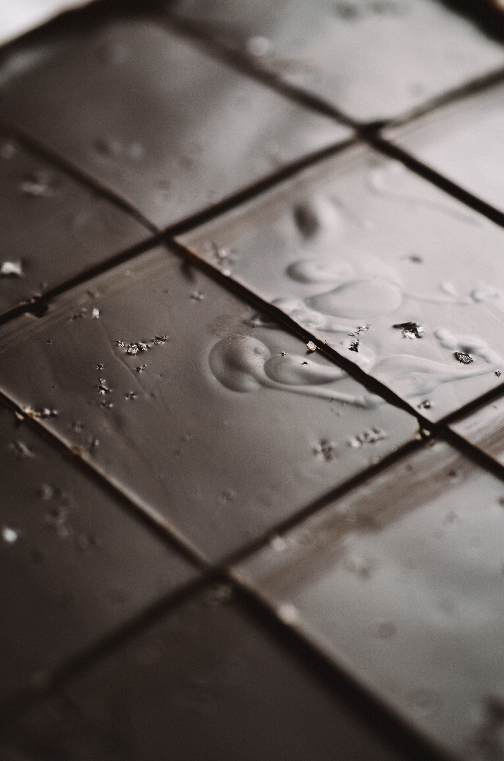 A solid layer of melted chocolate with sea salt