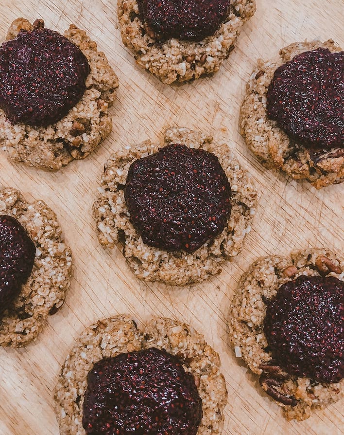 Delicious gluten-free, dairy-free, thumbprint cookies with a blueberry chia jam.